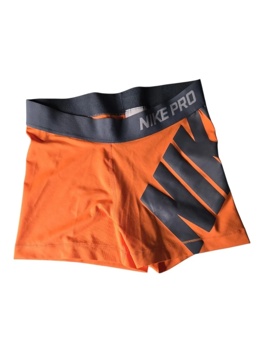 Nike Women's Orange Athletic Compression Shorts with Gray Logo